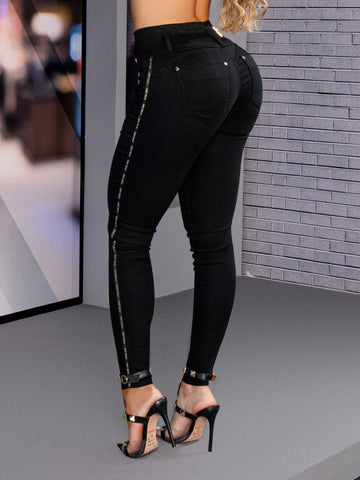 Pantalon skinny noir ultra gainant avec bande ventrale avec large ceinture et détails plaqués or